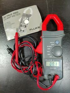 Fluke 32 AC Clamp Meter Amperage Voltage Ohmeter With Instruction Manual