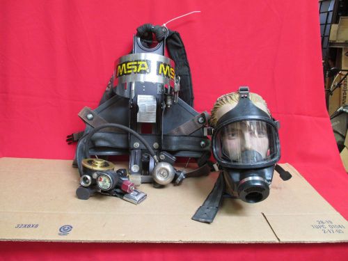 Used msa fire fighting harness with  gas mask and tube for sale