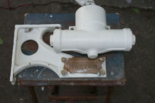 Vintage working norton cast iron door closer with bracket and original screws for sale