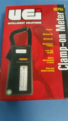 Uei analog clamp on meter tester ac amps volts ohms 9 ranges test leads mcp9a for sale