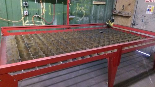 Plasma table with plasma cutter