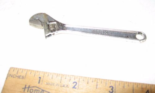 MARX ADJUSTABLE WRENCH  4 INCHES LONG ACCEPTS BOLT or NUT TO 5/8”.