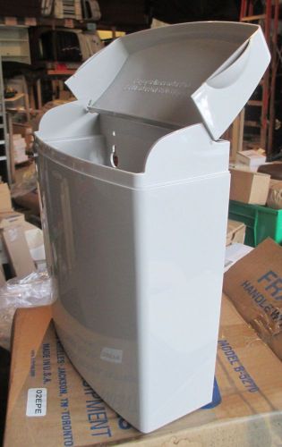 New Bobrick wall mount trash holder  #B-5270 tan plastic #130049