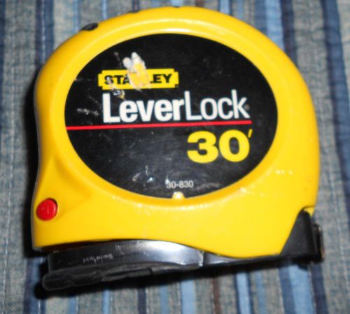 30 FT. LEVERLOCK TAPE MEASURE, AND A POCKET REFERENCE BOOK