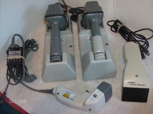2-symbol barcode scanners with cradles 2- others with wires for parts or repair