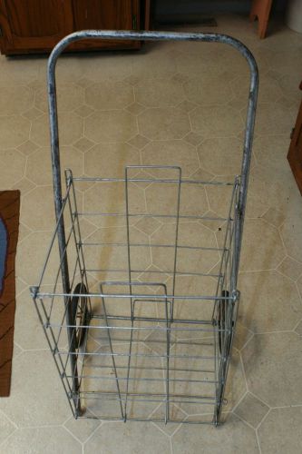 Vintage mid-century collapsing metal shopping cart hard rubber wheels wire spoke for sale