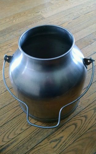 Stainless steel milking pail good size nice piece use or a decoration piece.