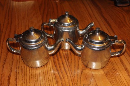3 STAINLESS STEEL CREAMERS OR TEA POTS