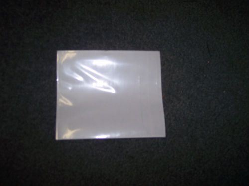 (1000) Poly CD/DVD Sleeve with Adhesive Back