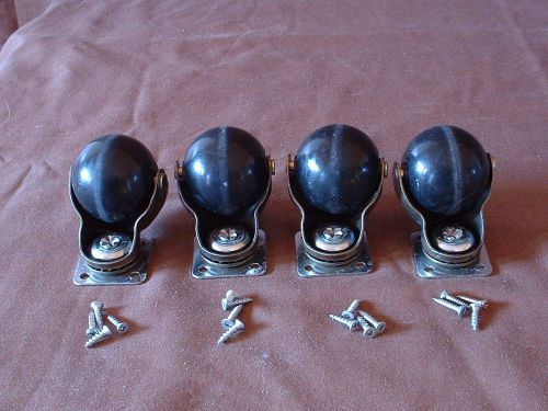 Set of four antique brass furniture castors(ball bearing) with screws for sale