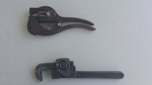 Vintage Trimo size 10 inch pipe wrench, and vintage Whitney Rockford hole punch