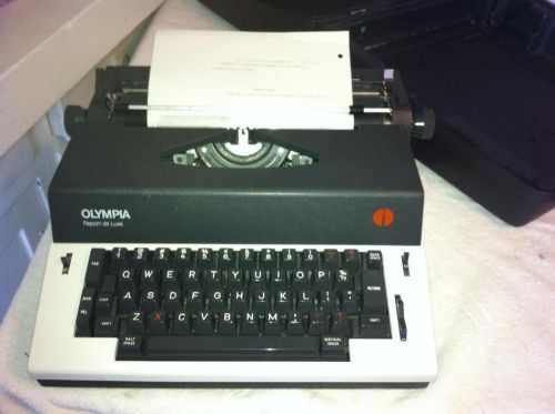 Vtg 70s OLYMPIA De Luxe SKE Black PORTABLE Hard Case Electric Typewriter Works