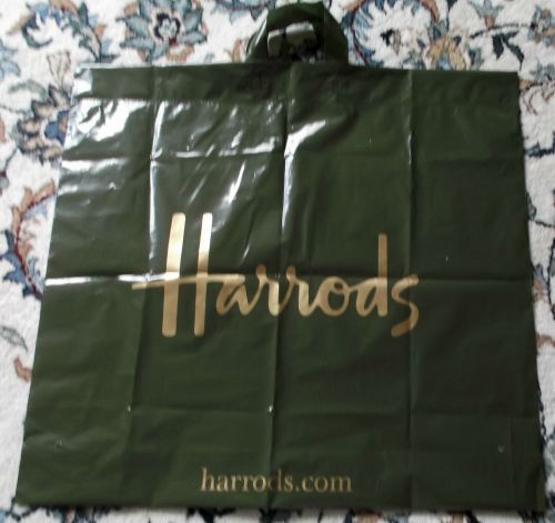 Harrods green and gold plastic carrier shopping bag