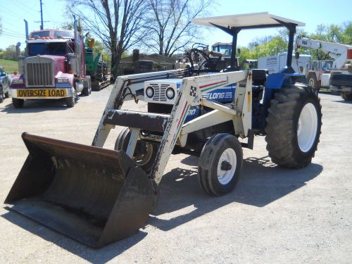 LONG 610 FARM TRACTOR W/ LOADER BOOM, BUCKET AND HAY SPEAR, CANOPY, PLEASE CALL!