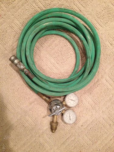 Oxygen regulator with hose and milton &#034;p&#034; style coupler. o2 regulator racing for sale