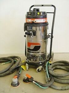 Dynabrade sander and vacuum. Model 61300 120v. 9.9 gallon, roller base. 2 sander
