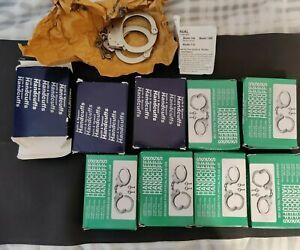 Vintage 9 sets mix of S&amp;W Smith &amp; Wesson Model  M100+ Nickel Handcuffs and keys
