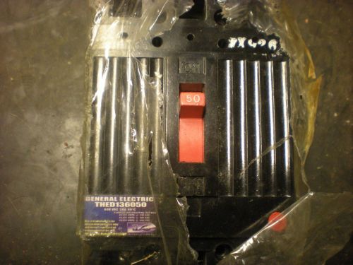 General electric 50 amp 3 pole breaker  w/shunt trip    thed136050      yc-126 for sale