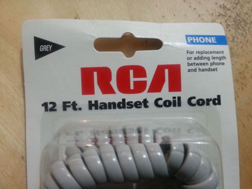 Lot of 21 New in box 12ft Handset Coil Cords. Mixed colors black, grey, ivory.