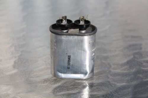Ge model #921l6027 motor run capacitor 440v, 3.5uf mfd, oval used for sale