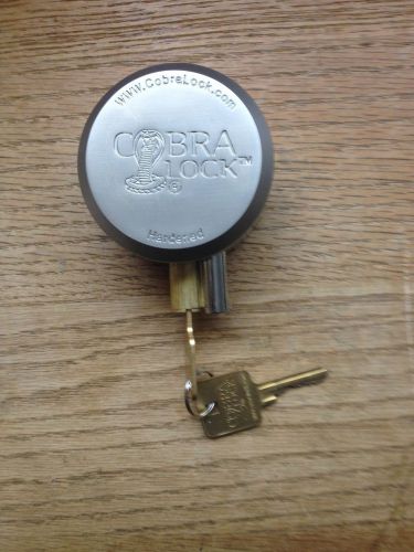 Hidden shackle- hockey puck padlock - &#034;new&#034; -- keyed alike--two flat keys for sale