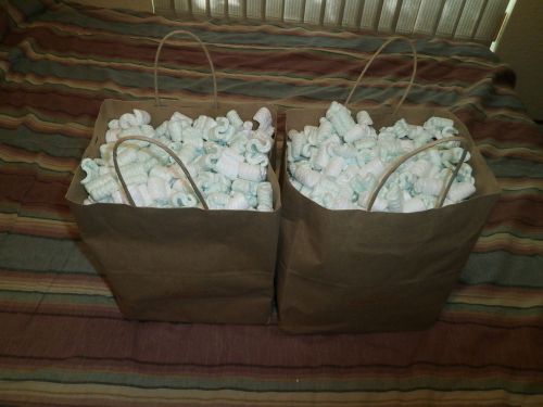 2 full bags of packing peanuts (white and green color). Free shipping!