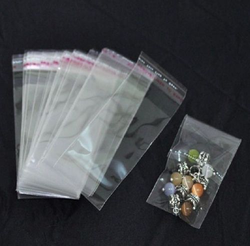 Brandnew 100pc.10x4cm self stick clear bags many uses/turn boring to presentable for sale