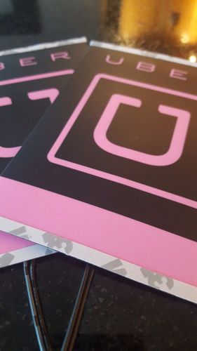 Glowing pink (illuminated) Uber logo sign for your car