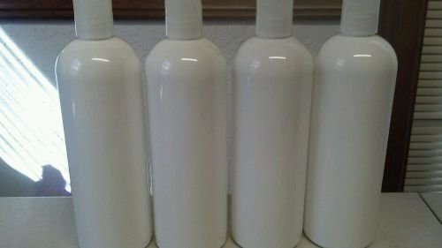 Lot (4)16 Oz Cosmo round white Plastic bottles with disk top