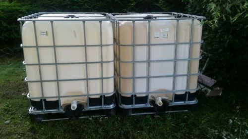 330-Gallon IBC Totes with Metal Cage with intergrated pallet attached.