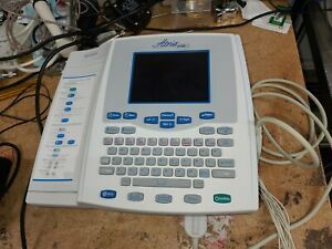Burdick Atria 6100 EKG UNIT AS PICTURED WORKING WITH POWER SUPPLY AND LEADS