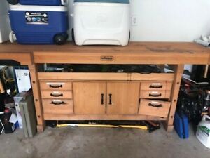 Sjoberg 96 inch solid wood workbench with cabinet with 2 vices