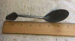 Primitive Metal Spoon Used In Sand Casting.