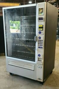 CRANE MERCHANDISING SYSTEM INC. 981D VENDING MACHINE