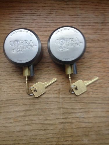 Two(2) hidden shackle- hockey puck padlocks - &#034;new&#034; -- keyed alike- (4)keys for sale