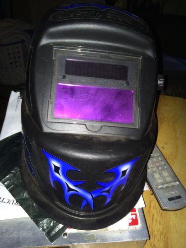 Auto darkening welding helmet with blue flame design for sale