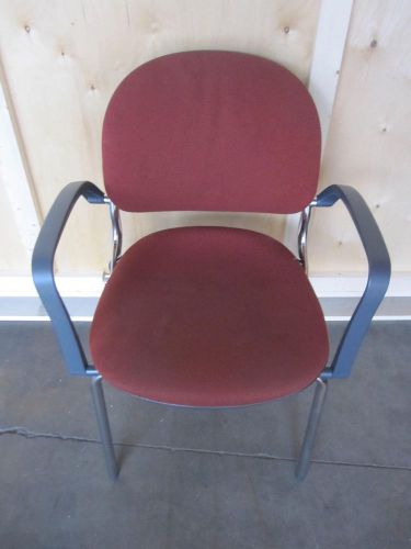 Orange stacking chair for sale