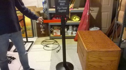 Black stanchion with wait esperar sign holder - retractable red belt 2 available for sale