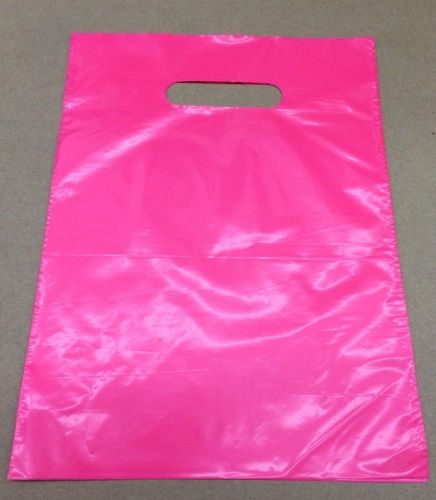 100 qty. hot pink plastic t-shirt retail shopping bags w/ handles 12 x 15 for sale
