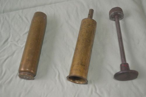 Brass piston type thingy, and 20 mm brass shell casing for sale