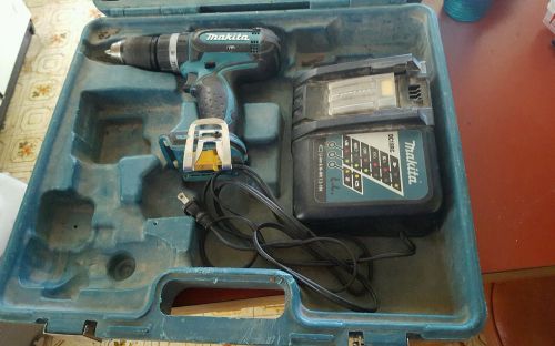 Makita hammer drill and battery charger