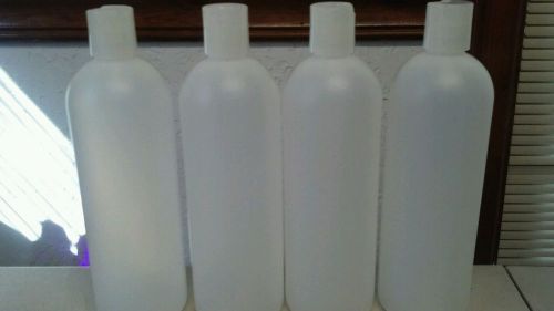 Lot (4)16 Oz Cosmo round natural Plastic bottles with disk top