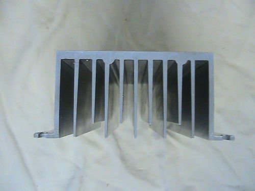 1 USED ALUMINUM HEAT SINK 7&#034; LONG 4 3/8&#034; WIDE 2 1/2&#034; HIGH WITH 6 TAPPED HOLES