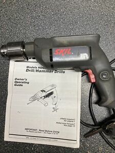 Skil heavy duty hammer drill HD6870 with Jacobs chuck 5/32”-5/8” cap.