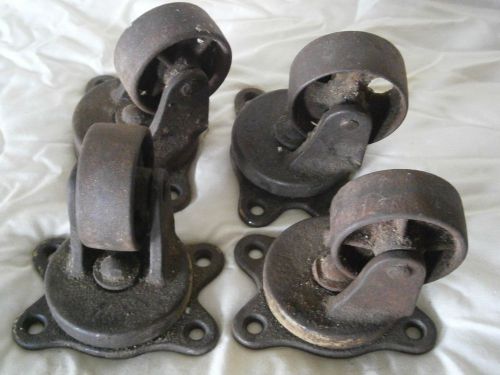 Set 4 antique industrial vtg cast iron caster cart wheels legs swivel for sale