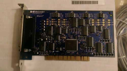 B&amp;B Electronics MIPort Universal PCI card with fan-out cable and driver CD.