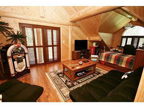 Handcrafted log home for sale