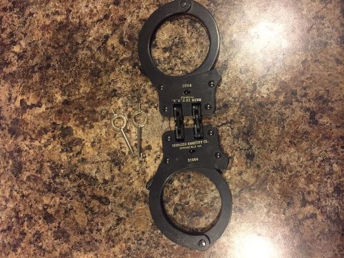 Peerless model 802c hinged black police handcuffs for sale