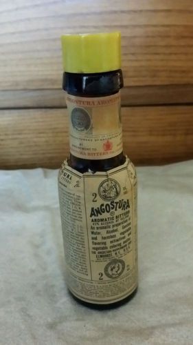 Vintage used Angostura Bitters bottle 2 oz ounce