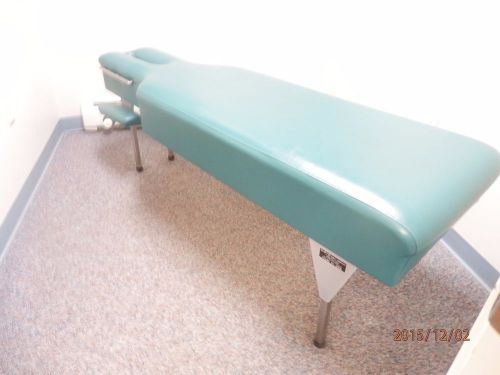 Lloyd Adjusting Therapy Table Teal with arm rest, head rest paper, metal legs